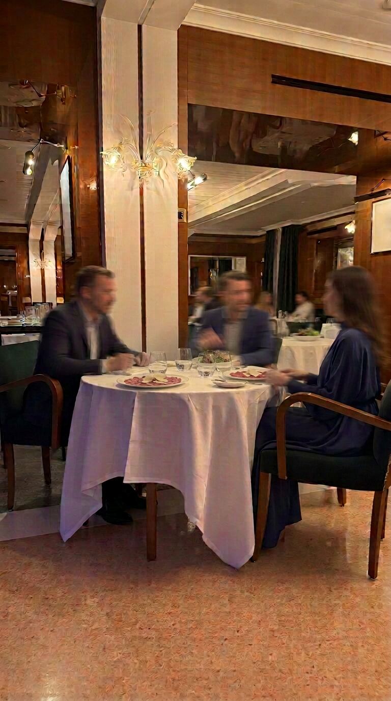 Guests dining together in a warmly lit restaurant